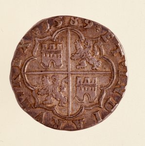 عملة فضية (8 ريالات) من إسبانيا: عهد فيليب (فيليبو أو فيليب) الثاني (1556-1598). 1589 ديم. 3،5 سم نابولي ، المتحف الأثري بواسطة المدرسة الاسبانية