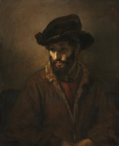 رجل ملتح يرتدي قبعة بواسطة Studio of Rembrandt van Rijn