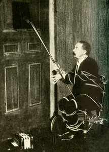 جون نيفيل ماسكلين يؤدي خدعة روح مجلس الوزراء ، c1910. بواسطة غير معروف