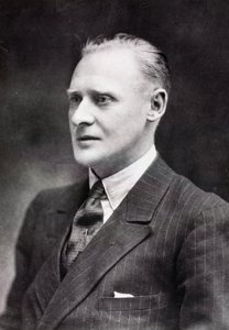آر جيه ميتشل ، مصمم طائرات إنجليزي ، ج 1933 بواسطة غير معروف