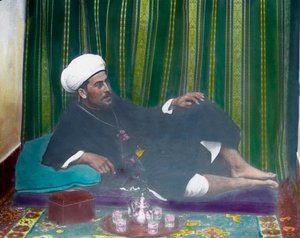 تناول الشاي العربي بواسطة فنان غير معروف