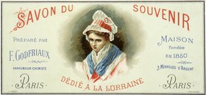 ملصق إعلاني لـ "Soap du souvenir ، من إعداد F. Godfriaux - Maison التي تأسست عام 1850". الطباعة الحجرية الملونة في القرن التاسع عشر. بواسطة فنان غير معروف