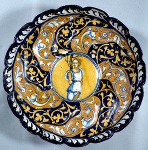 Godronnee faience cup decoree of an angelot. القرن السادس عشر في باريس ، متحف اللوفر بواسطة فنان غير معروف