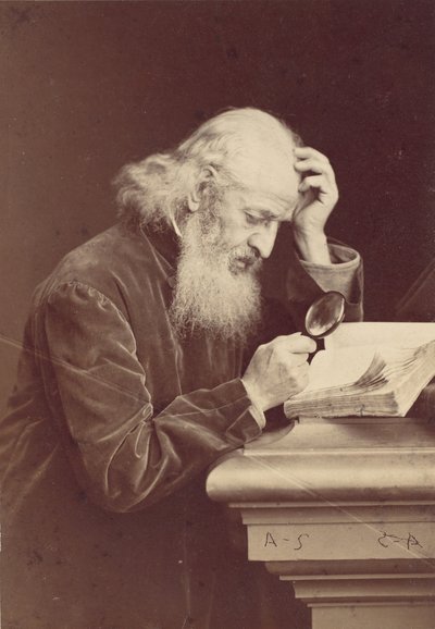 [رجل ملتح مع عدسة مكبرة يفحص مخطوطة] ، 1870. بواسطة أنطوان صموئيل آدم سالومون