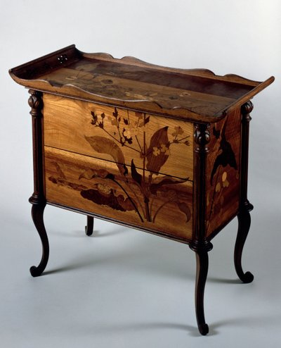 Art Nouveau style commode with polychrome inlays and tray top بواسطة اميل جالي