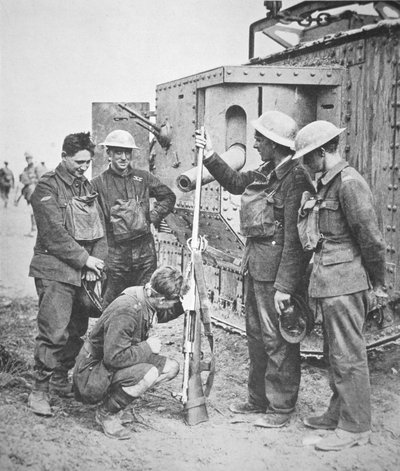 British tank crew inspect a German anti-tank rifle, which fired a cartridge five inches long (b/w photo) بواسطة مصور انجليزى