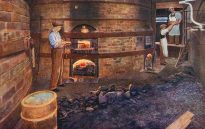 Firing china in the kilns of a porcelain works (colour litho) بواسطة مدرسة اللغة الإنجليزية