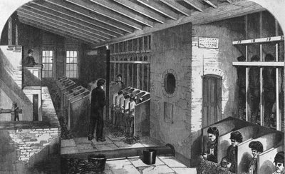 فقي العجلة و Oakum-Shed في سجن المدينة ، هولواي ، من "السجون الجنائية في لندن ومشاهد حياة السجن" هنري مايهو وجون بيني ، 1862 (النقش) بواسطة مدرسة اللغة الإنجليزية
