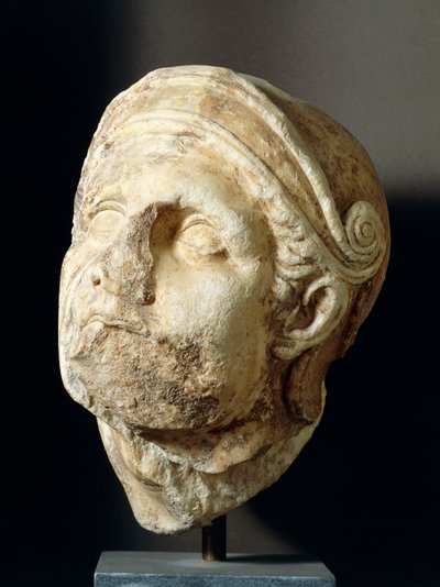 Warrior head by Skopas (340-420BC) from front of Athena Alea Temple at Tegea, 4th century BC (photo) بواسطة اليونانية