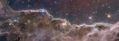 المنحدرات الكونية في سديم كارينا (NIRCam و MIRI Composite Image) بواسطة تلسكوب جيمس ويب الفضائي (ناسا)