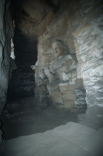 China, Shanxi province, sandstone statue of Buddha in Yungang Grottoes بواسطة غير معروف غير معروف