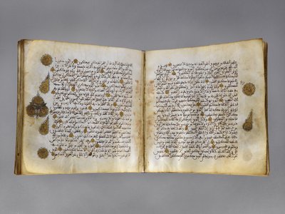 مخطوطة قرآنية بالخط المغربي نهاية ربيع الأول 718 هـ (1318 م) (حبر وألوان وذهب على رق) بواسطة المدرسة المغربية