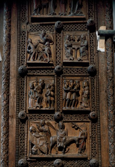 Romanesque art: wooden door from the middle of the 12th century of the Church of St. Mary of the Capitol in Cologne, Germany (Sankt Maria im Kapitol, Koln). Scenes depicting the announcement to the shepherds, the nativity, the adoration of the mages and th بواسطة رومانيسك