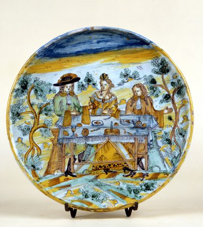 تمثيل مأدبة في الهواء الطلق على طبق خزفي من Talavera de la reina (إسبانيا). أوائل القرن السادس عشر. ميلانو ، متحف ديل كاستيلو. بواسطة المدرسة الاسبانية