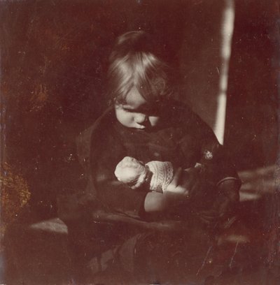 بيتي رينولدز مع Doll on Lap ، كاليفورنيا. 1885. بواسطة توماس إيكنز