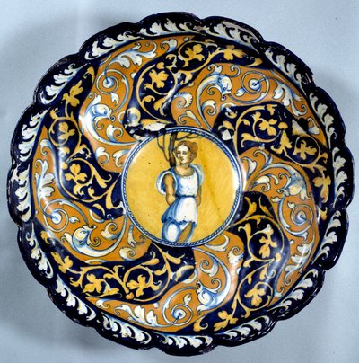 Godronnee faience cup decoree of an angelot. القرن السادس عشر في باريس ، متحف اللوفر بواسطة فنان غير معروف