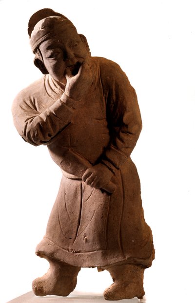 الفن الصيني: تمثال صغير من الطين يمثل شخصية "ويسلر". من تسياو تسو ، هونان. أسرة يوان (1271-1368 م). بواسطة اسرة يوان الصينية