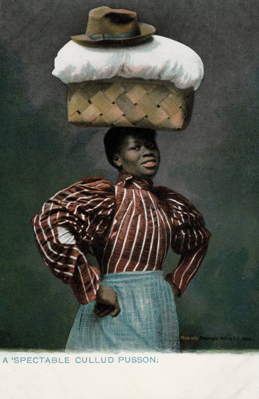 Black girl with a basket of linen, topped by a hat, on her head (photo) بواسطة مصور انجليزى