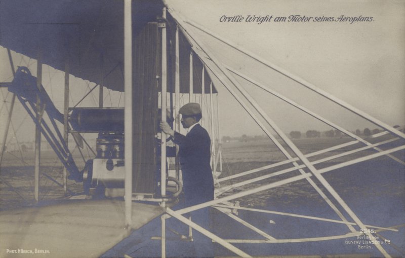 American aviator Orville Wright inspecting the engine of his aeroplane (b/w photo) بواسطة مصور فوتوغرافي ألماني